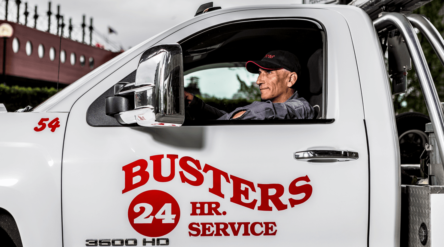 Busters recovery operator in Unit 54 with 24-hour service livery
